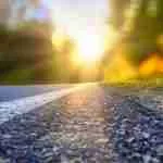 Road bend disappearing into the horizon